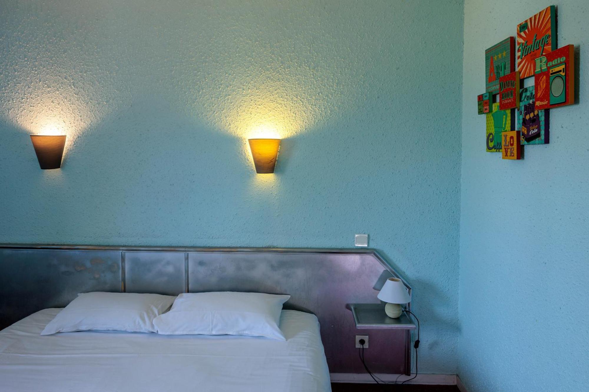 Logis Hotel Noemys Brive - Restaurant Le Teinchurier Kamer foto